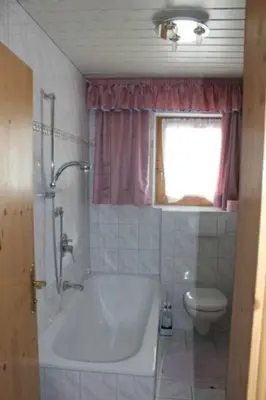 Ein Badezimmer in der Unterkunft Waldvilla am See
