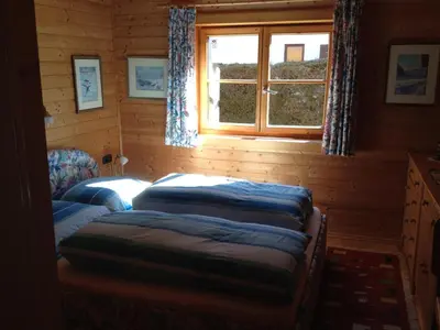 Ein Bett oder Betten in einem Zimmer der Unterkunft Ferienhaus Zirmheim