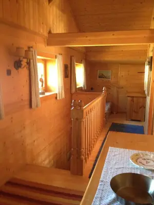 Ein Bett oder Betten in einem Zimmer der Unterkunft Ferienhaus Zirmheim