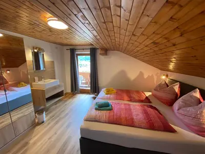 Ein Bett oder Betten in einem Zimmer der Unterkunft Ferienwohnung Marianne