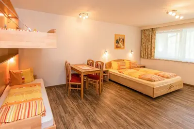 Ein Bett oder Betten in einem Zimmer der Unterkunft Appartment Hotel Mitterer