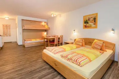 Ein Bett oder Betten in einem Zimmer der Unterkunft Appartment Hotel Mitterer