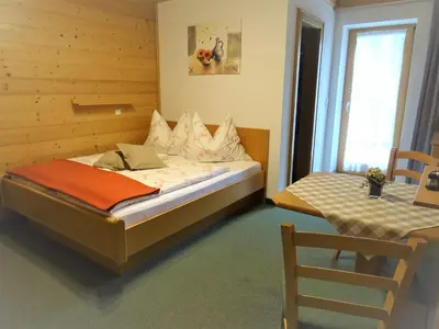 Ein Bett oder Betten in einem Zimmer der Unterkunft Ferienwohnungen Niederacher