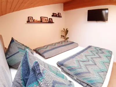 Ein Bett oder Betten in einem Zimmer der Unterkunft Haus Bacher Leogang