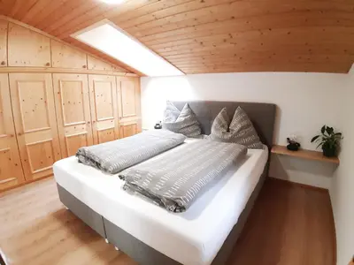Ein Bett oder Betten in einem Zimmer der Unterkunft Haus Bacher Leogang