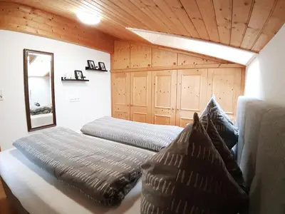 Ein Bett oder Betten in einem Zimmer der Unterkunft Haus Bacher Leogang