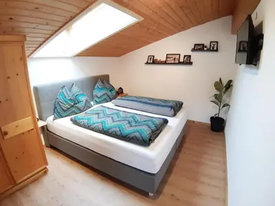 Ein Bett oder Betten in einem Zimmer der Unterkunft Haus Bacher Leogang