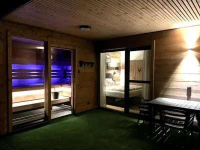 Ein Bett oder Betten in einem Zimmer der Unterkunft Kitzbüheler Alpenlodge Bergblick Suite