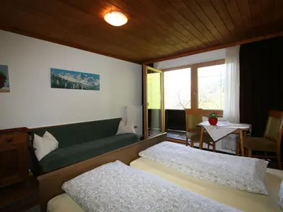 Ein Bett oder Betten in einem Zimmer der Unterkunft Apartment Tom by Interhome