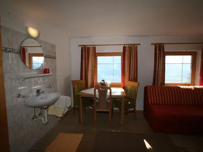Ein Sitzbereich in der Unterkunft Apartment Tom by Interhome