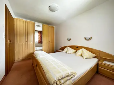 Ein Bett oder Betten in einem Zimmer der Unterkunft Haus Luxer