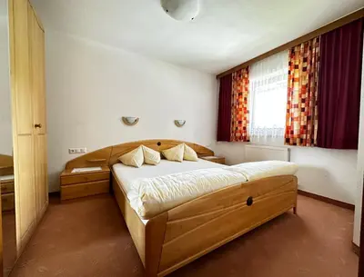 Ein Bett oder Betten in einem Zimmer der Unterkunft Haus Luxer