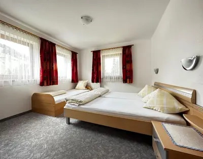 Ein Bett oder Betten in einem Zimmer der Unterkunft Haus Luxer
