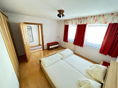 Ein Bett oder Betten in einem Zimmer der Unterkunft Haus Luxer