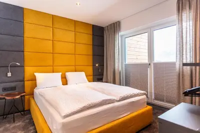 Ein Bett oder Betten in einem Zimmer der Unterkunft lechner living apartments