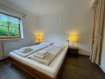 Ein Bett oder Betten in einem Zimmer der Unterkunft Haus Monika