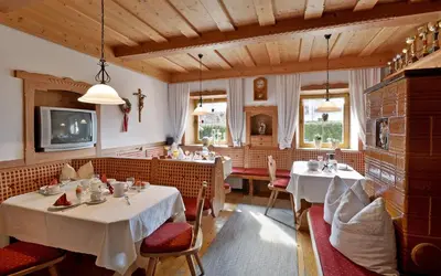 Ein Sitzbereich in der Unterkunft Hüttschmiedhof