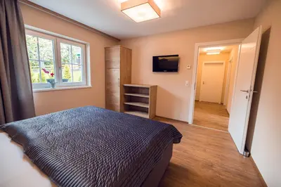 Ein Bett oder Betten in einem Zimmer der Unterkunft Chalet Arena