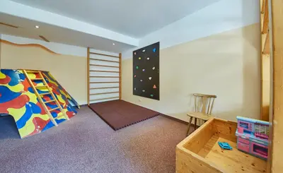 Ein Bett oder Betten in einem Zimmer der Unterkunft Apart-Hotel Forellenhof