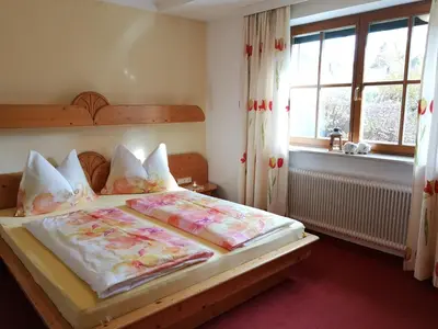 Ein Bett oder Betten in einem Zimmer der Unterkunft Vornbichlhof