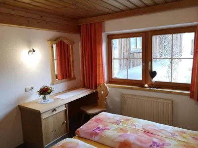 Ein Bett oder Betten in einem Zimmer der Unterkunft Vornbichlhof