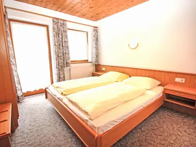 Ein Bett oder Betten in einem Zimmer der Unterkunft Apartment Voithofer-1 by Interhome