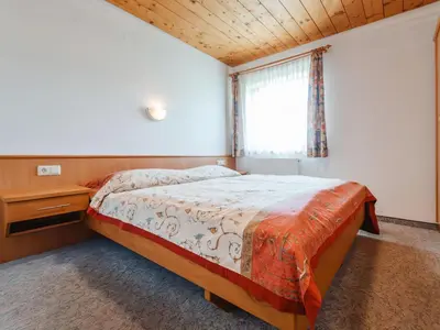 Ein Bett oder Betten in einem Zimmer der Unterkunft Apartment Voithofer-7 by Interhome