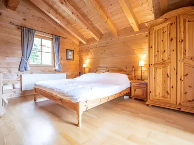 Ein Bett oder Betten in einem Zimmer der Unterkunft Chalet Königsleiten 2 by Interhome