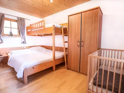 Ein Bett oder Betten in einem Zimmer der Unterkunft Chalet Königsleiten 2 by Interhome