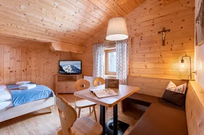 Ein Bett oder Betten in einem Zimmer der Unterkunft Au Alm Appartements