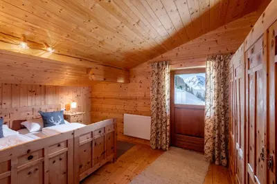 Ein Bett oder Betten in einem Zimmer der Unterkunft Au Alm Appartements