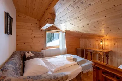 Ein Bett oder Betten in einem Zimmer der Unterkunft Au Alm Appartements