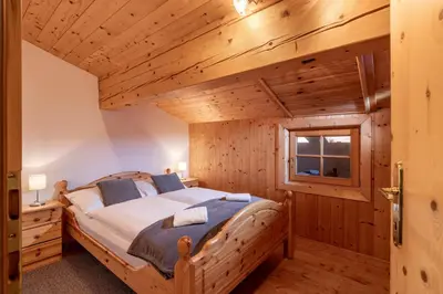 Ein Bett oder Betten in einem Zimmer der Unterkunft Au Alm Appartements
