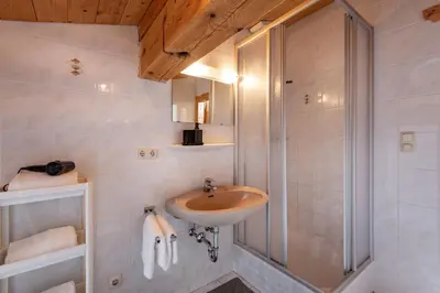 Ein Badezimmer in der Unterkunft Au Alm Appartements