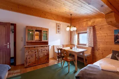 Ein Bett oder Betten in einem Zimmer der Unterkunft Au Alm Appartements