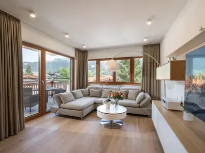 Ein Sitzbereich in der Unterkunft Herzi Chalet - top ausgestattet, neu, chic und sehr gemütlich