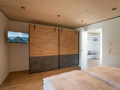 Ein Bett oder Betten in einem Zimmer der Unterkunft Ferienwohnung Auszeit am See