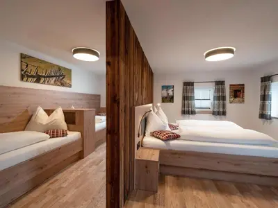 Ein Bett oder Betten in einem Zimmer der Unterkunft Appartement Am Hof Untertann