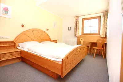 Ein Bett oder Betten in einem Zimmer der Unterkunft Ferienwohnung Königsleiten 210 - Top 1