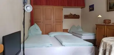 Ein Bett oder Betten in einem Zimmer der Unterkunft Casa Alpina Apartment - Pool&Sauna - by Hermann Weiss