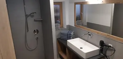 Ein Badezimmer in der Unterkunft Frankenhof