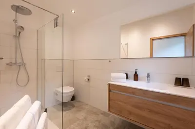 Ein Badezimmer in der Unterkunft Ferienhäuser Kaiserluft Chalet