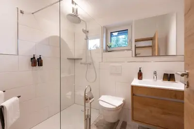 Ein Badezimmer in der Unterkunft Ferienhäuser Kaiserluft Chalet