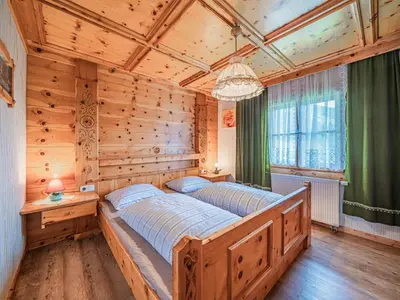Ein Bett oder Betten in einem Zimmer der Unterkunft Poschen