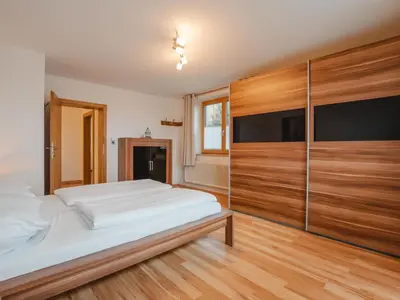 Ein Bett oder Betten in einem Zimmer der Unterkunft Apartment Hüttaler by Interhome