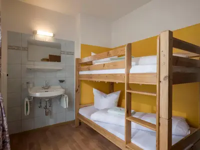 Ein Bett oder Betten in einem Zimmer der Unterkunft Holiday Home Apart Anneliese by Interhome