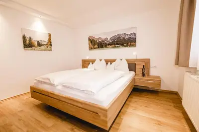 Ein Bett oder Betten in einem Zimmer der Unterkunft Landhaus Kröll - Barbara Kröll