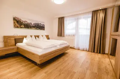 Ein Bett oder Betten in einem Zimmer der Unterkunft Landhaus Kröll - Barbara Kröll
