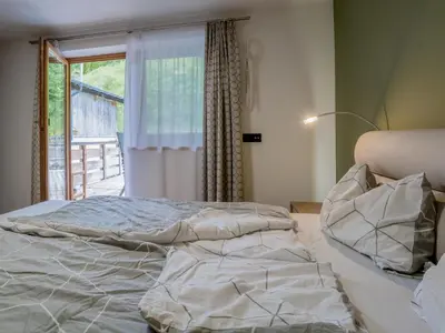 Ein Bett oder Betten in einem Zimmer der Unterkunft Blumenwiese I