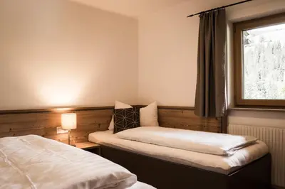 Ein Bett oder Betten in einem Zimmer der Unterkunft Chalet Gasteig